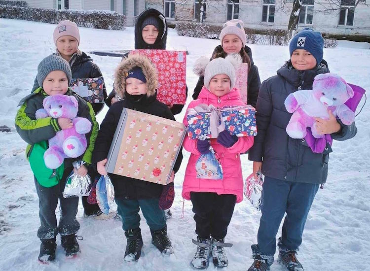 Ukrainian children receiving Christmas present from North Norfolk donations
